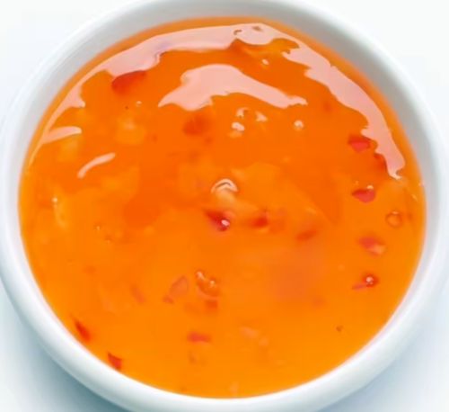 Appelsiinikastiketta kulhossa